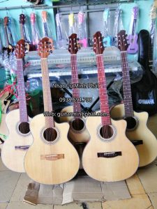 Hình chụp thật tế tại shop đàn guitar Minh Phát - Những mẫu đàn guitar gỗ hồng đào giá rẻ chất lượng nhất tại shop -> kèm full phụ kiện khi mua đàn tại shop nhé !